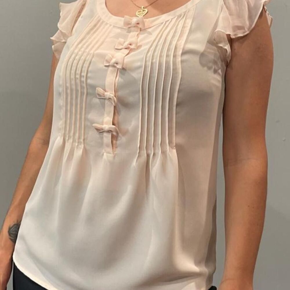 Cream silk blouse with ruffle sleeves and Bow Detail in front